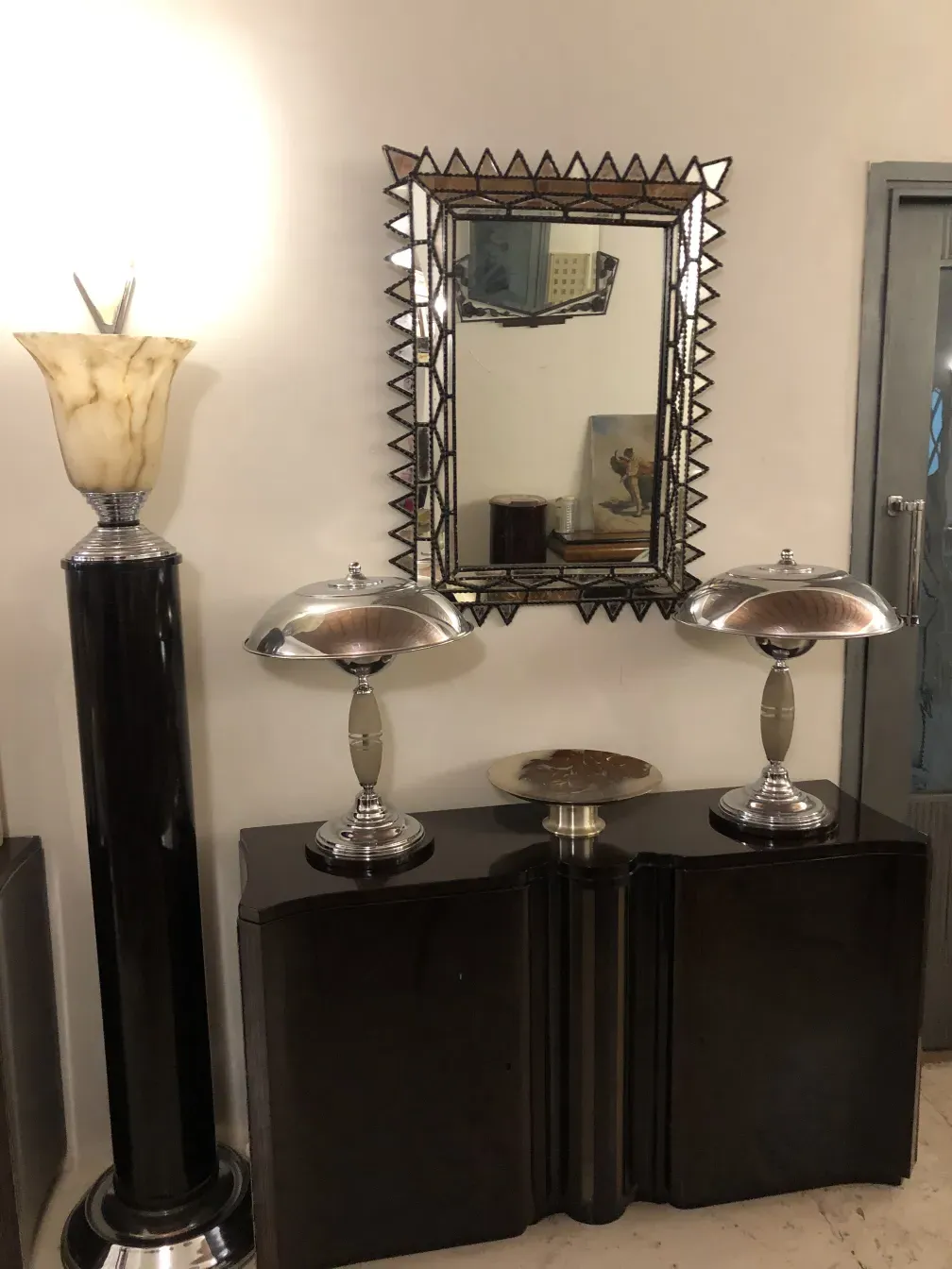 antique mirror with zigzag frame and details