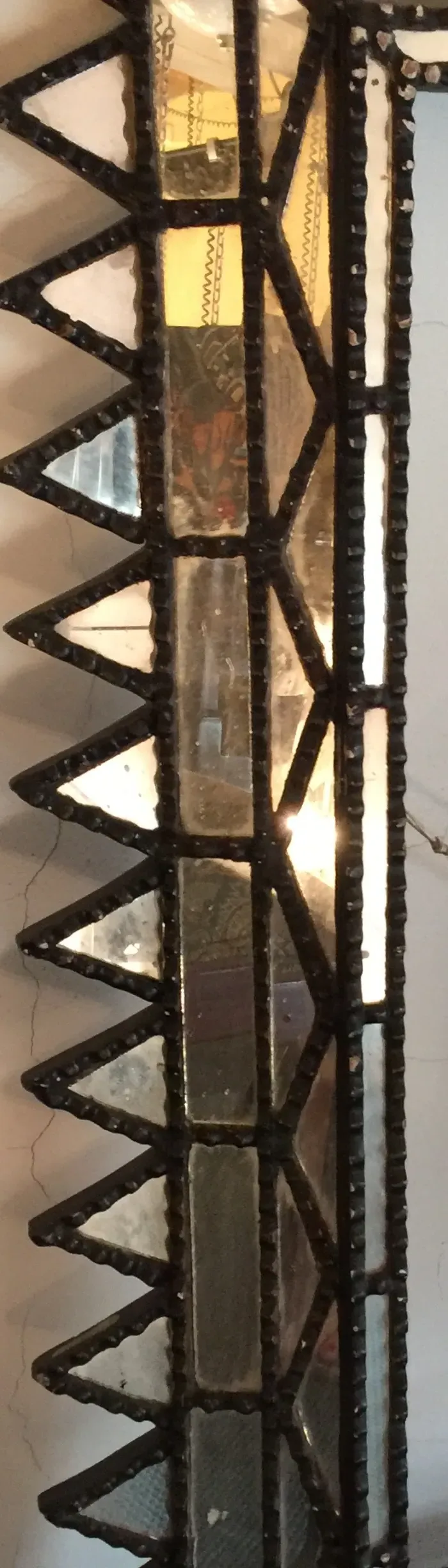 antique decorative mirror with triangular and square shapes