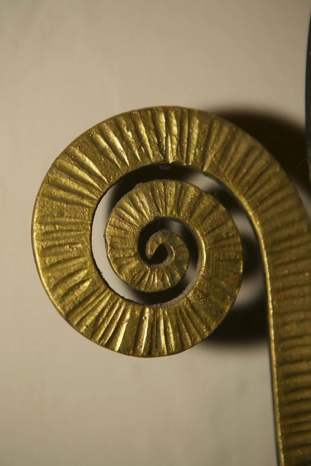 close-up of an antique mirror with spiral design