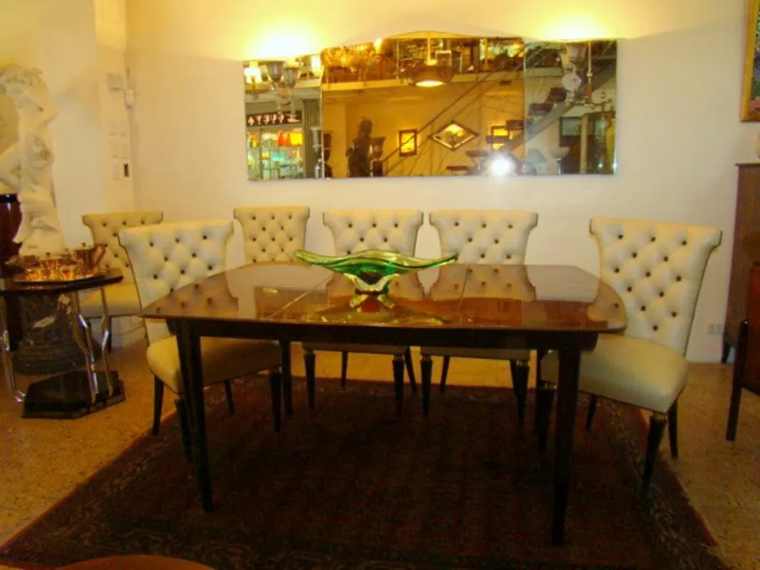 antique decorative mirror in an elegant living room with chairs