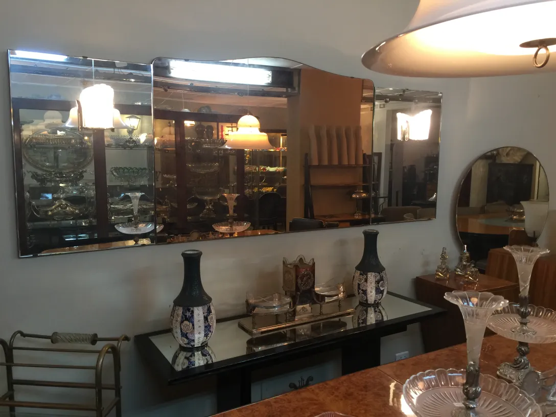 antique decorative mirror reflecting soft lighting and details