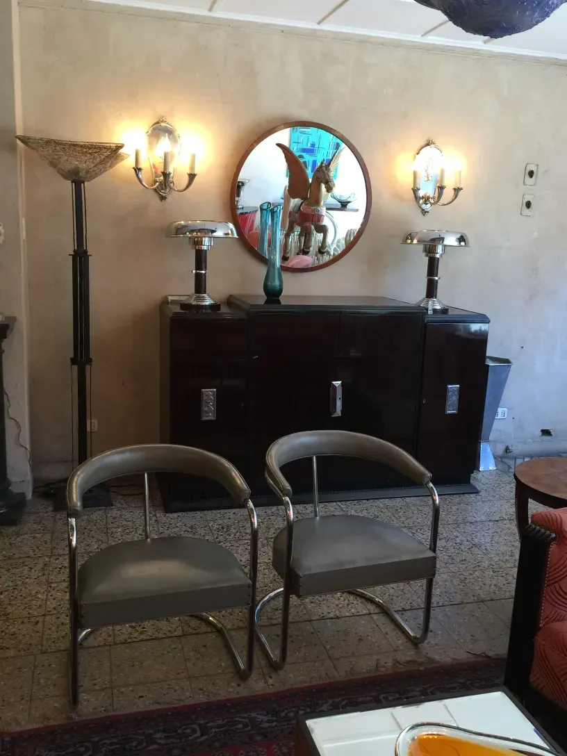 antique round mirror with golden reflections and decoration