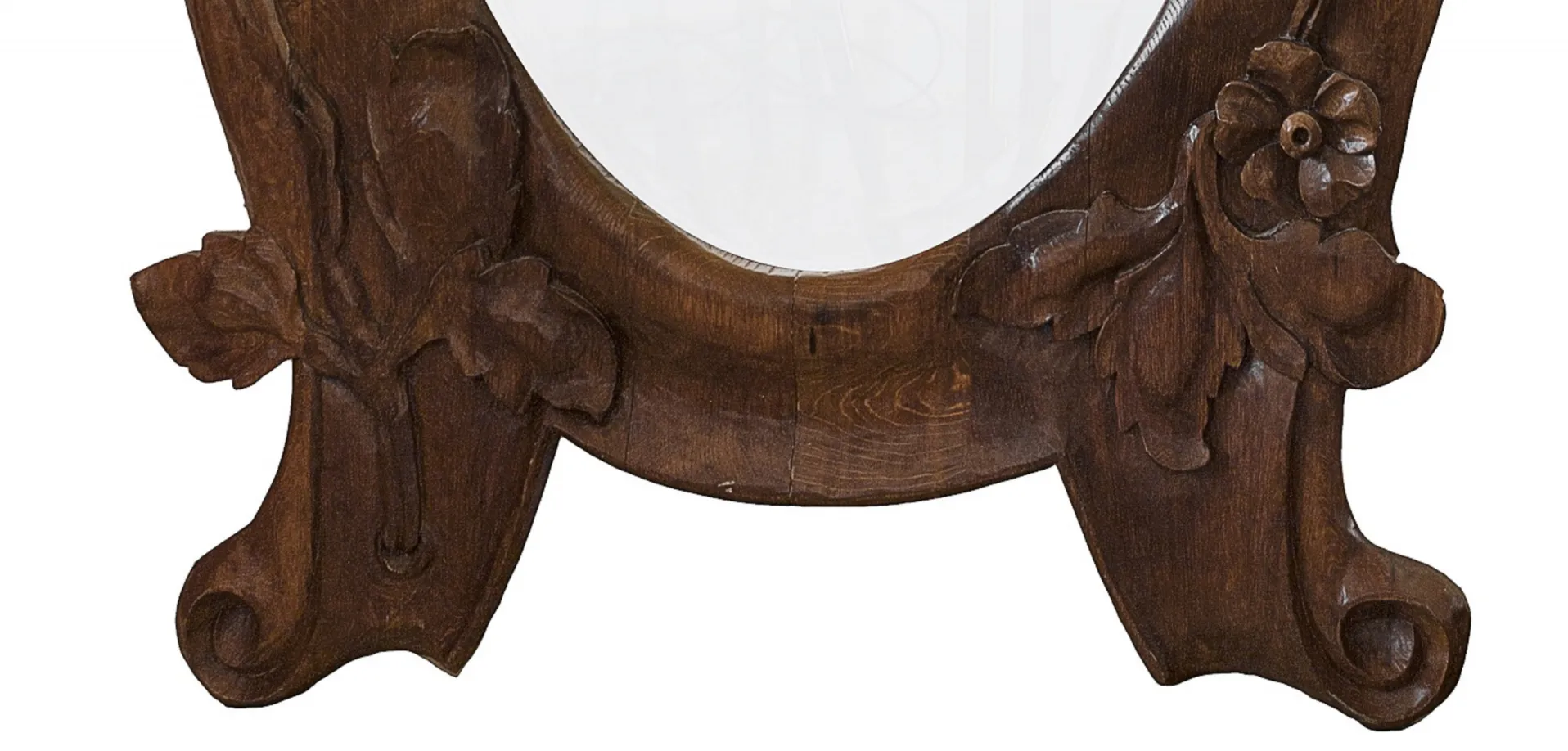 antique mirror with detailed frame and carved flowers