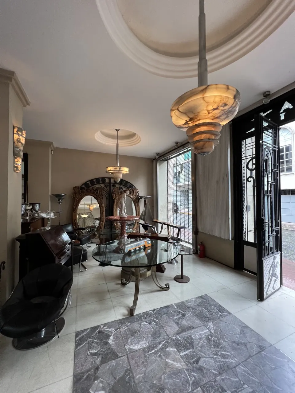 Antique mirror in Art Nouveau style in an elegant setting.