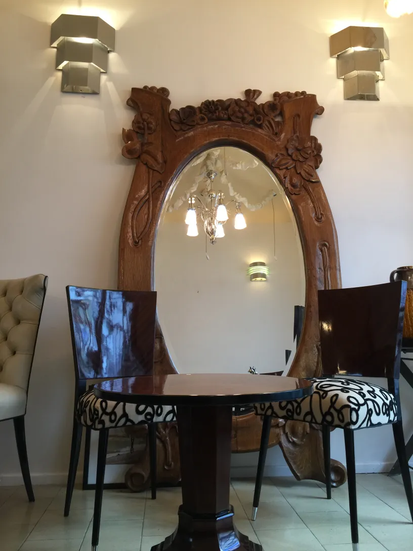 decorative antique mirror in art nouveau style with flowers