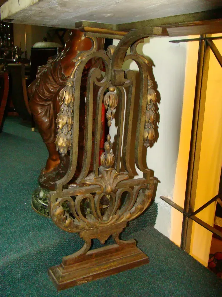 antique console dresser with elaborate decorations