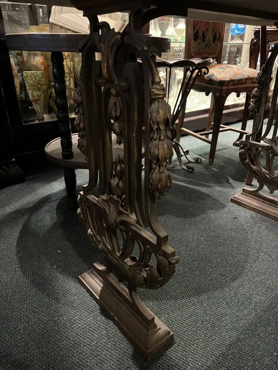 decorative details on the base of an antique console