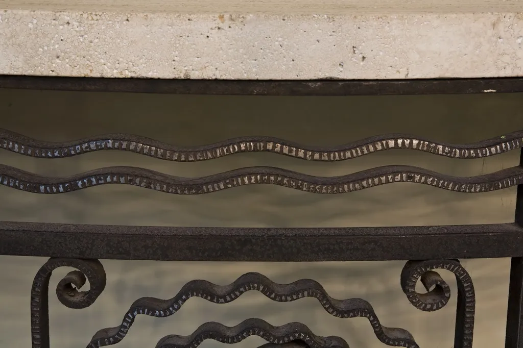 decorative antique console with iron details