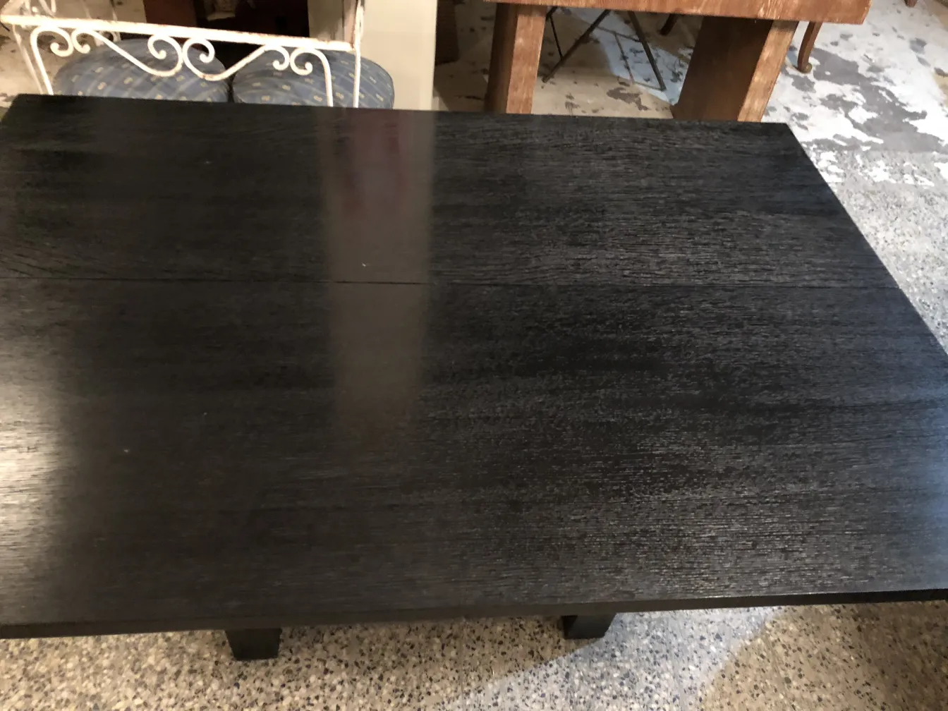 antique console in dark color with smooth surface