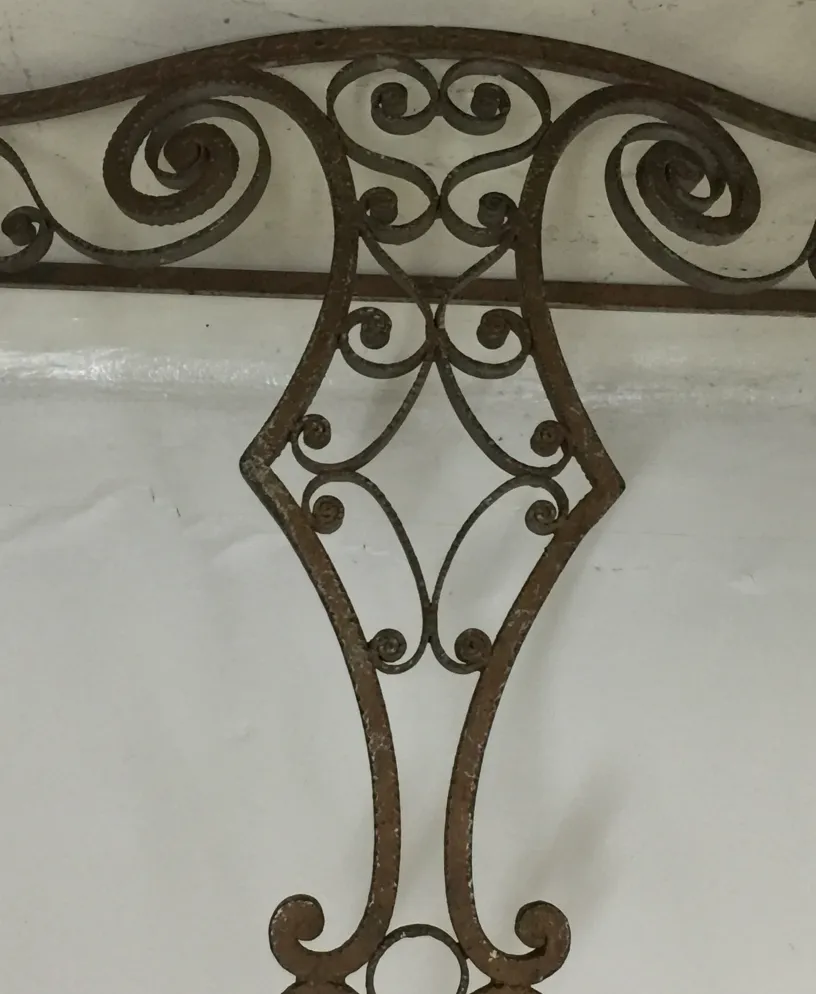 Detail of an antique console decoration with curved design
