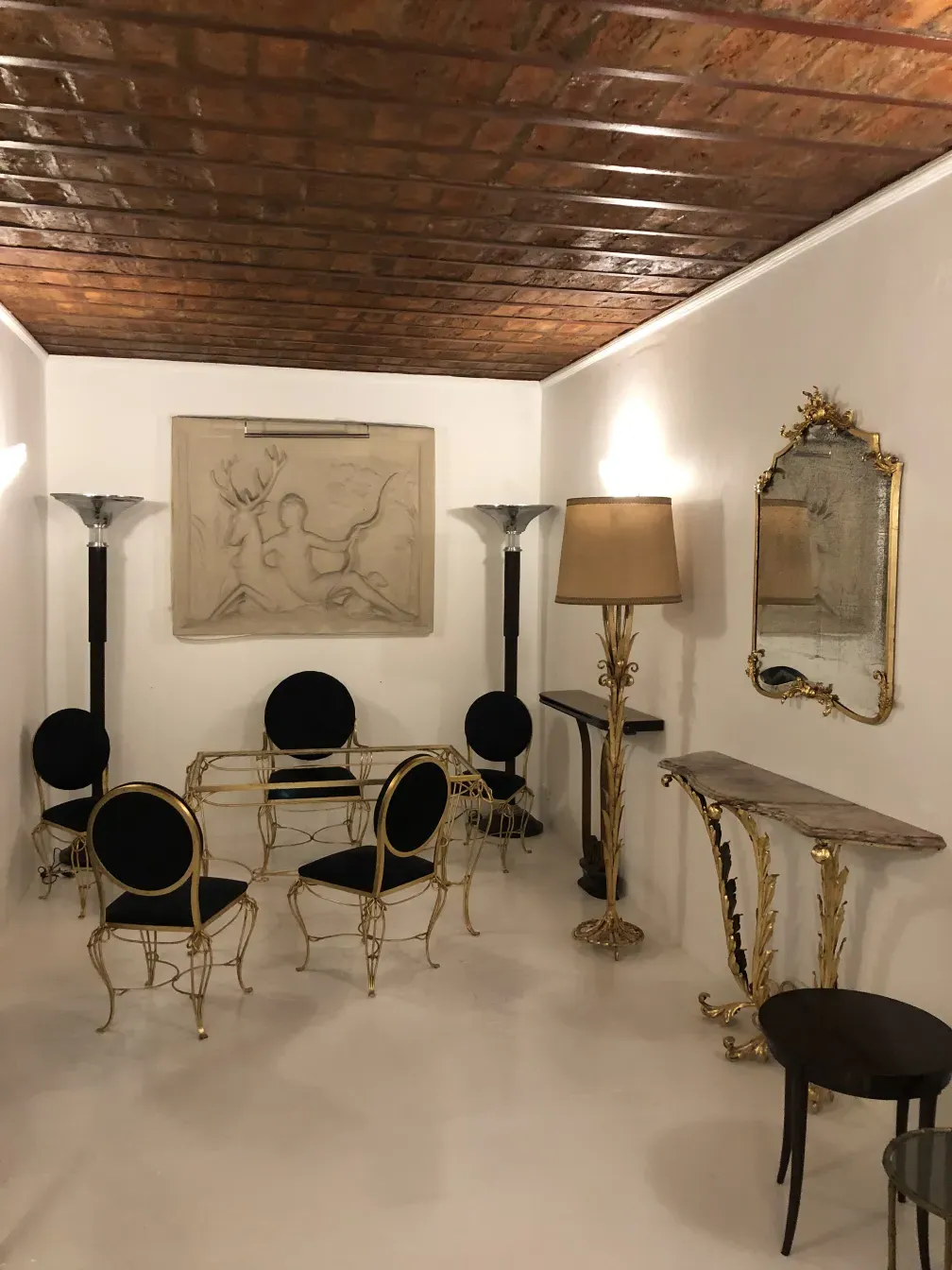 Antique decorative console with gold details.