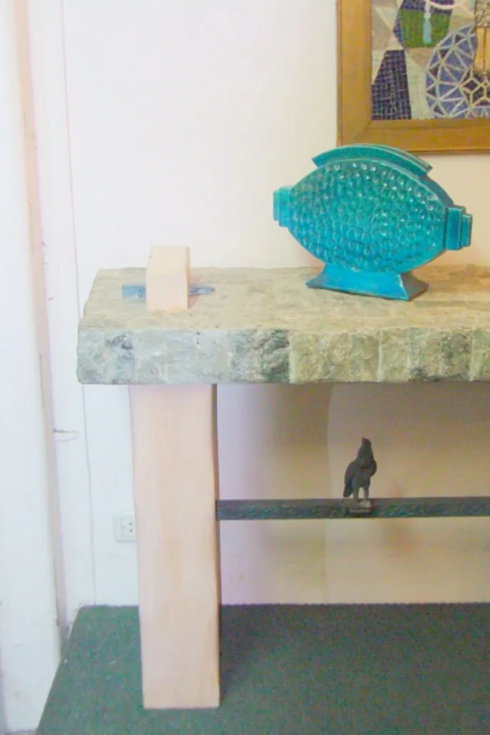 antique console table with modern decor