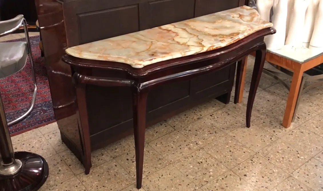 Antique console with decorative marble surface