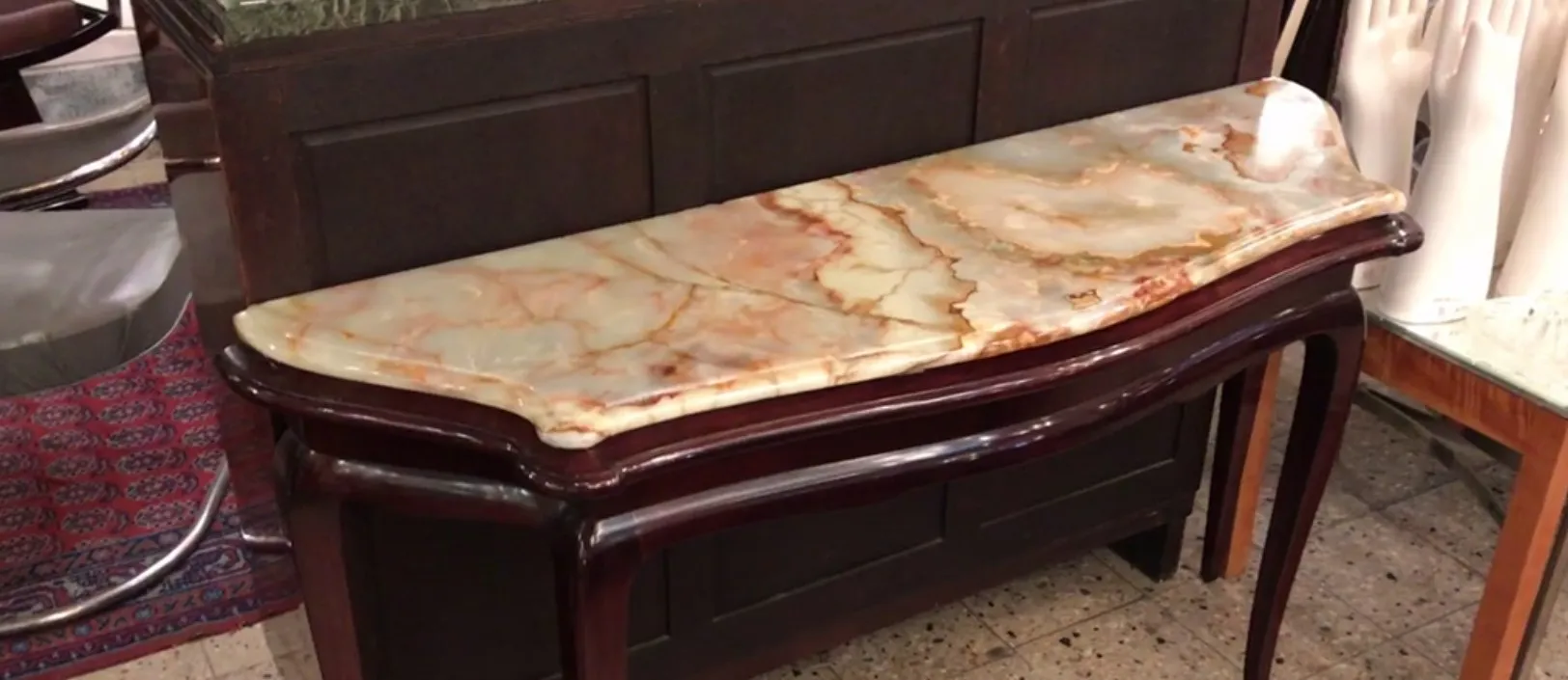 antique console table with decorative surface