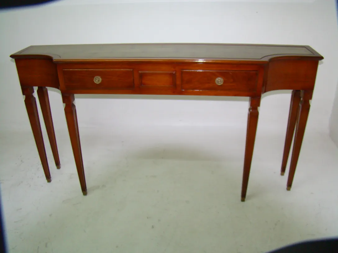 antique console with thin legs and drawer pulls