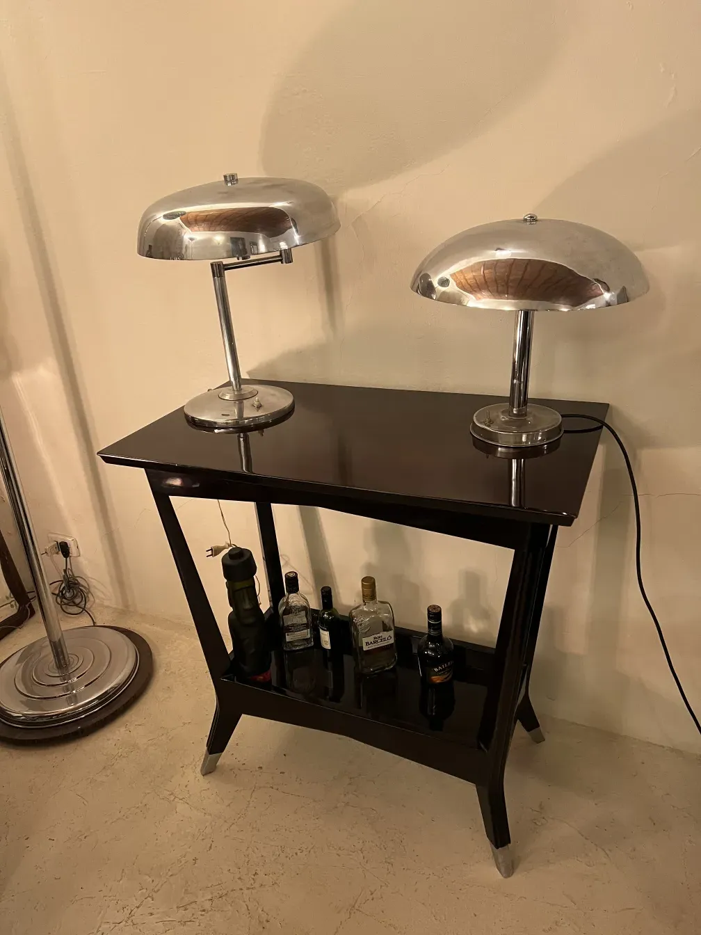 antique bar console with liquor bottles