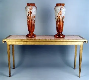 antique console decorated with two large vases