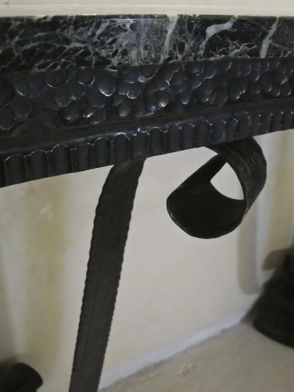 antique console with decorative black details