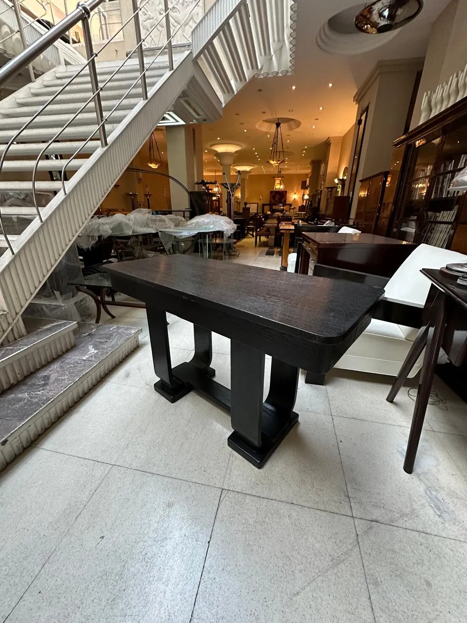elegantly designed antique console in a decorative space