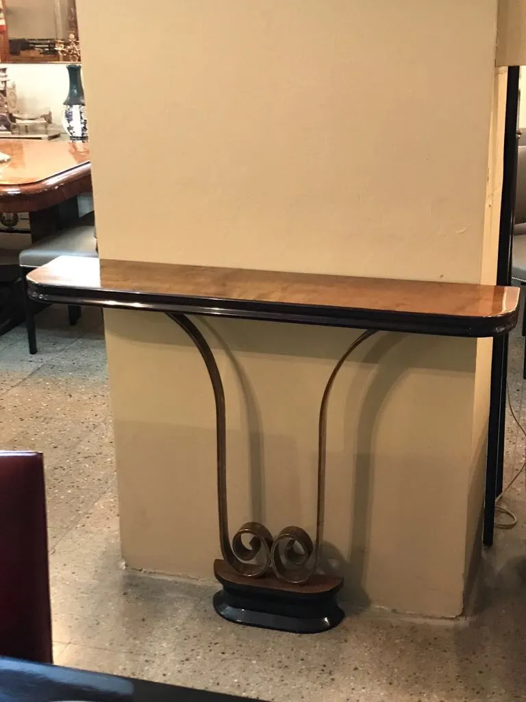 two elegant antique consoles in a cozy setting