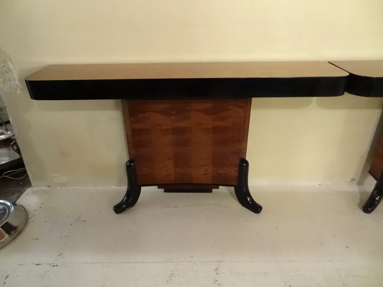 two antique consoles with elegant design