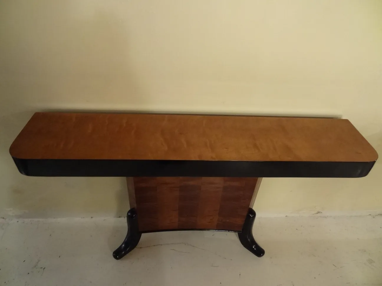 two antique consoles with elegant and functional design