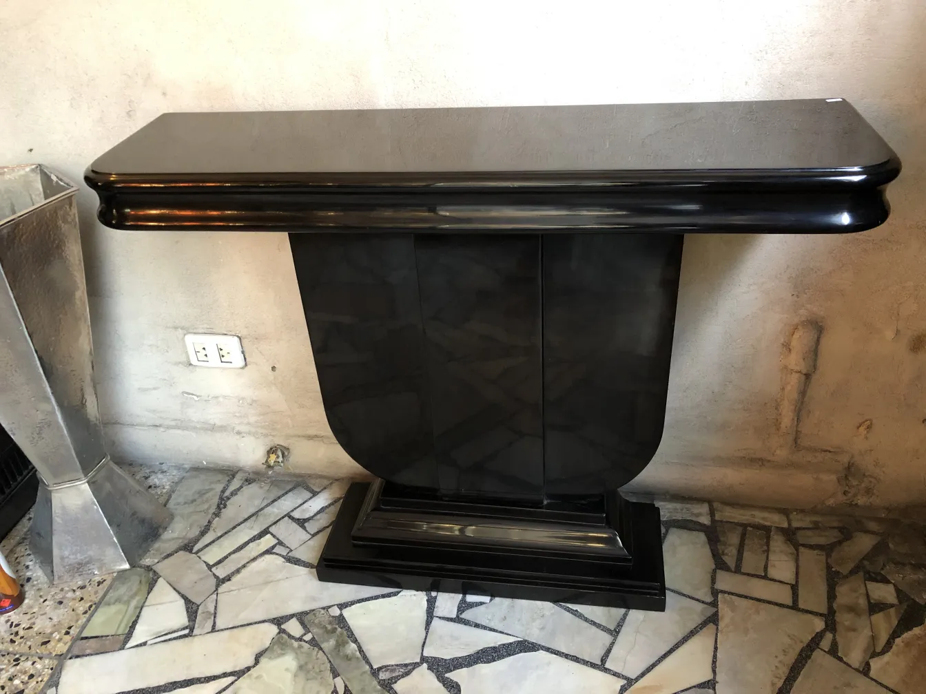 two elegant antique consoles in a cozy setting