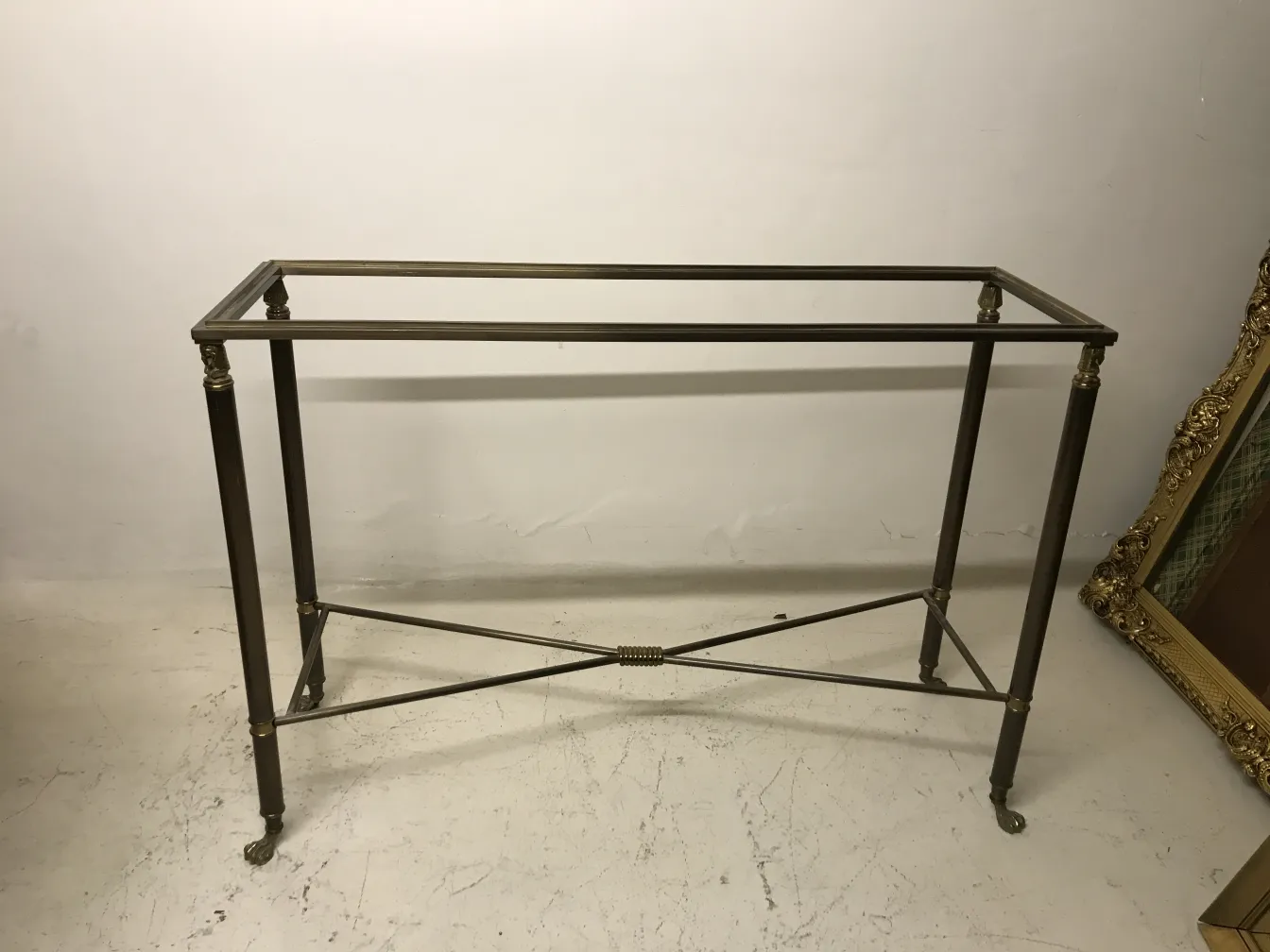 Three antique consoles featuring an elegant and sophisticated design, perfect for decor