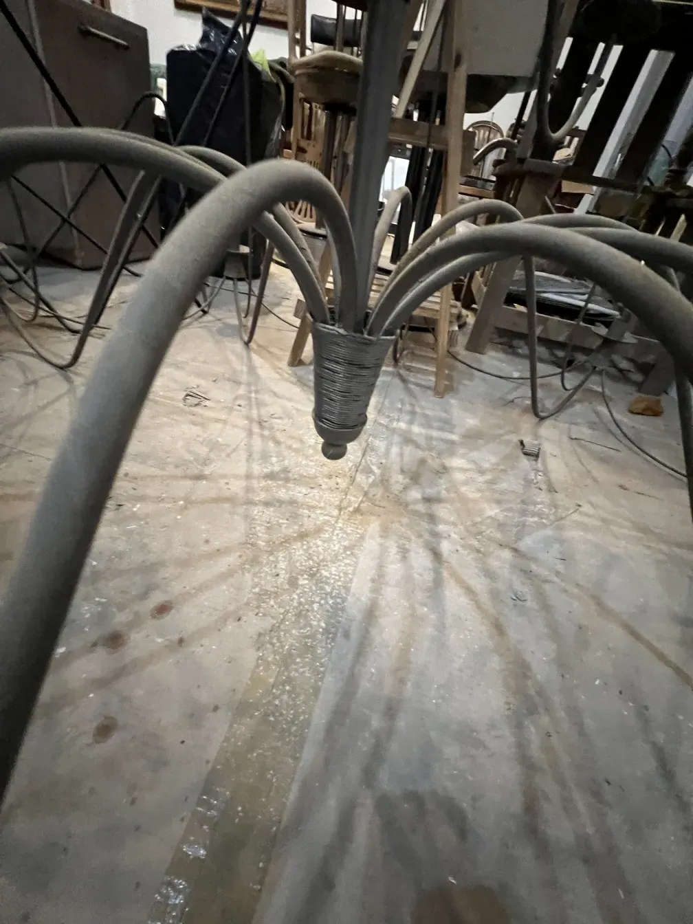 Three antique hanging lamps in a rustic setting