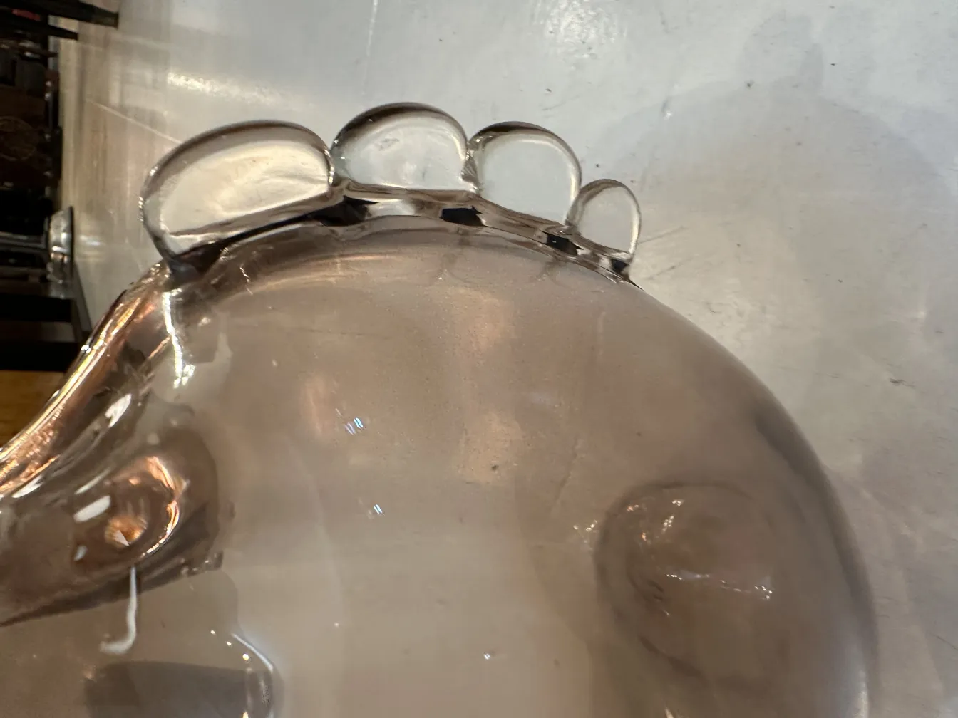 antique murano vase with curved details and warm background