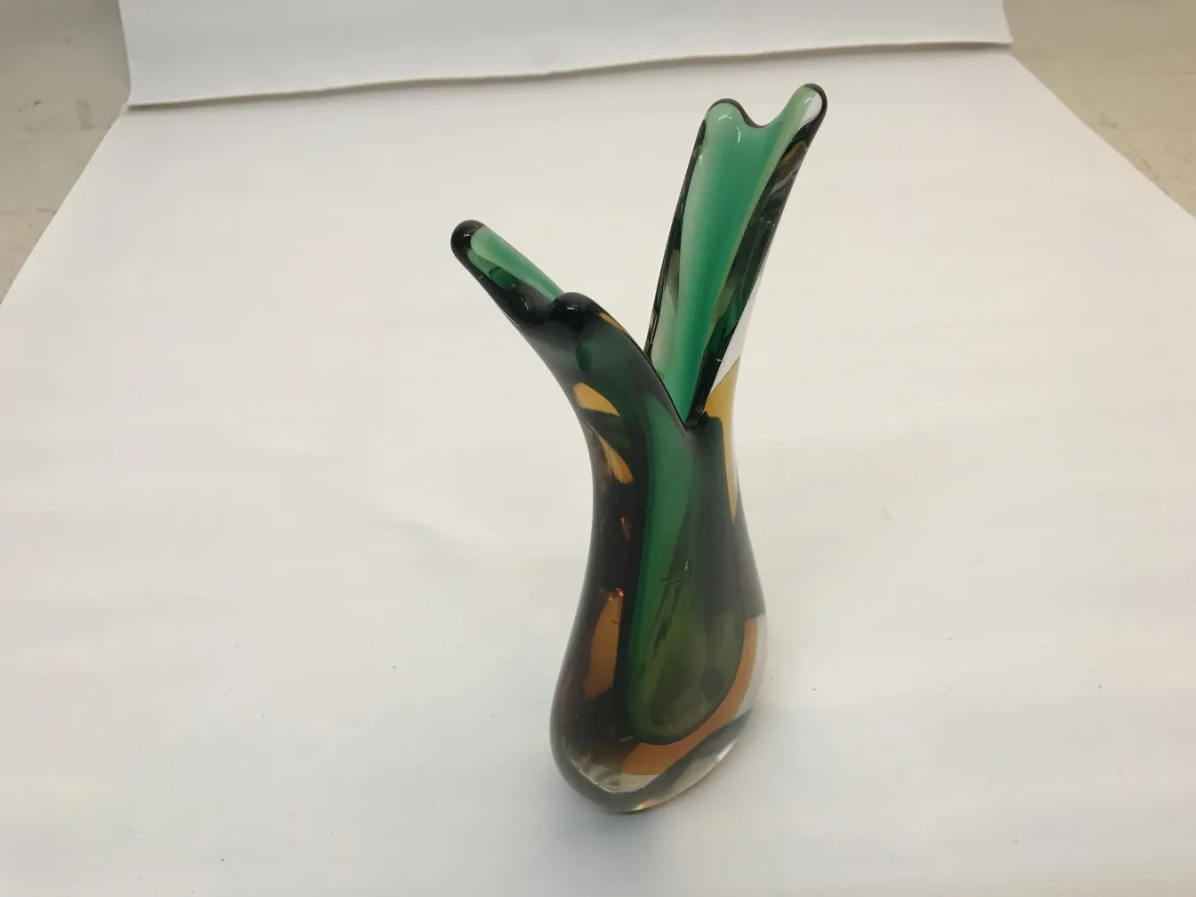 antique murano vase, vivid colors and elegant design in a minimalist setting