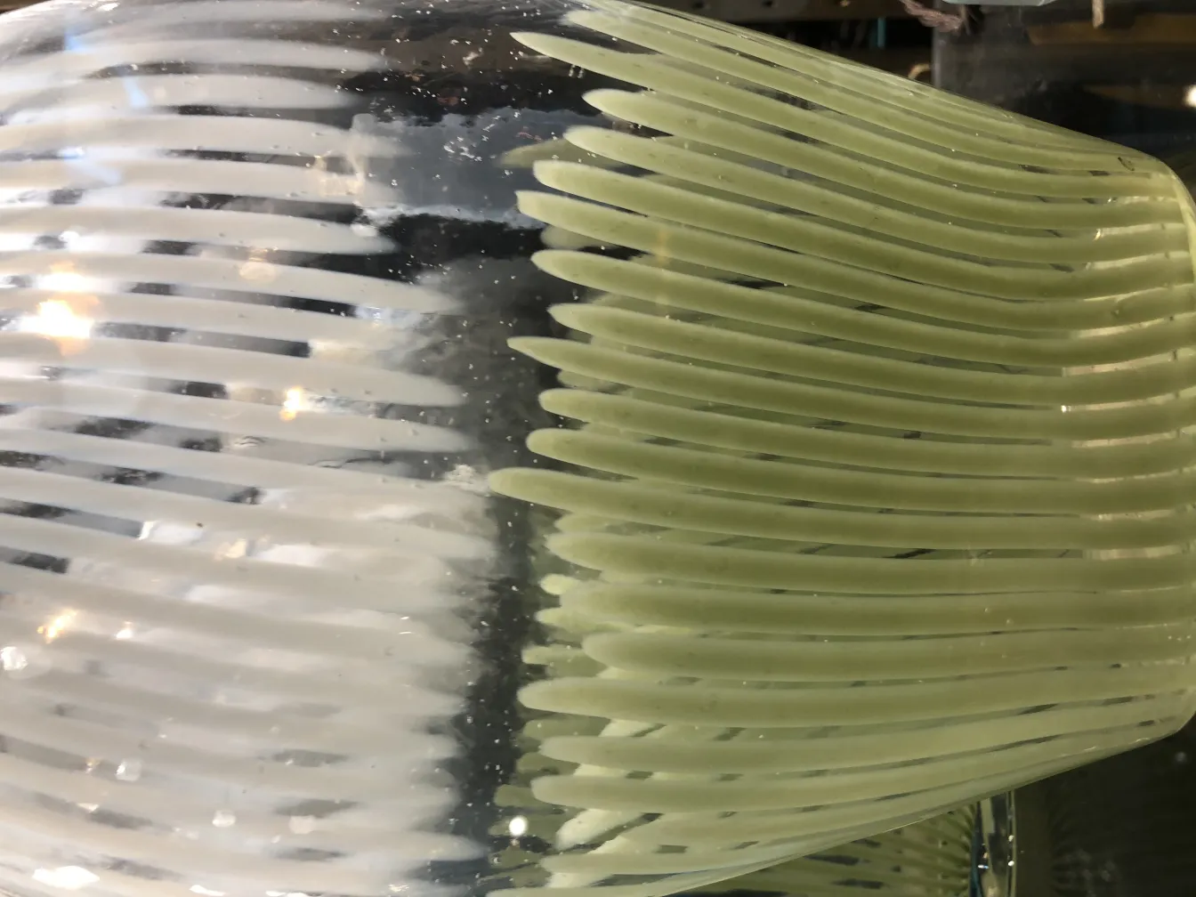 antique murano vase with light colors and wavy design, classic style in decorative setting