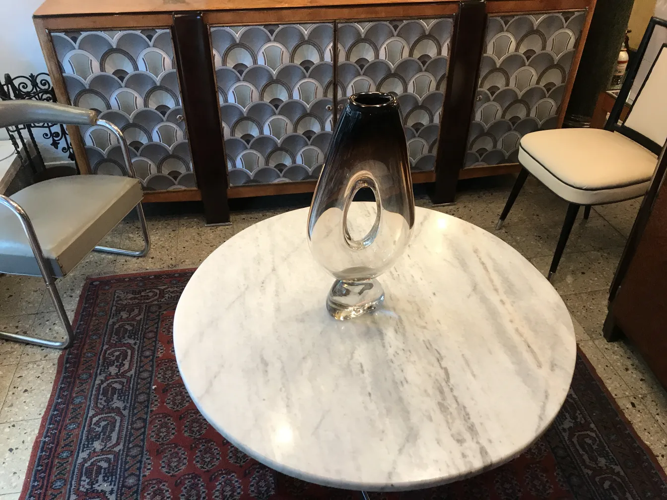 vase with unique shape on marble table, antique decor