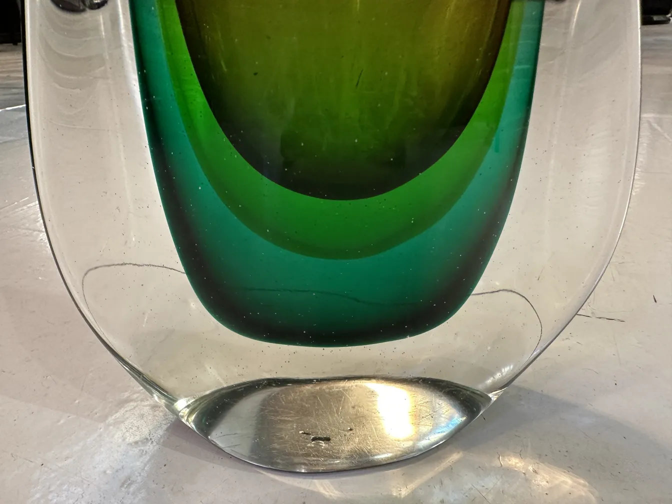 antique murano vase with smooth shapes in green