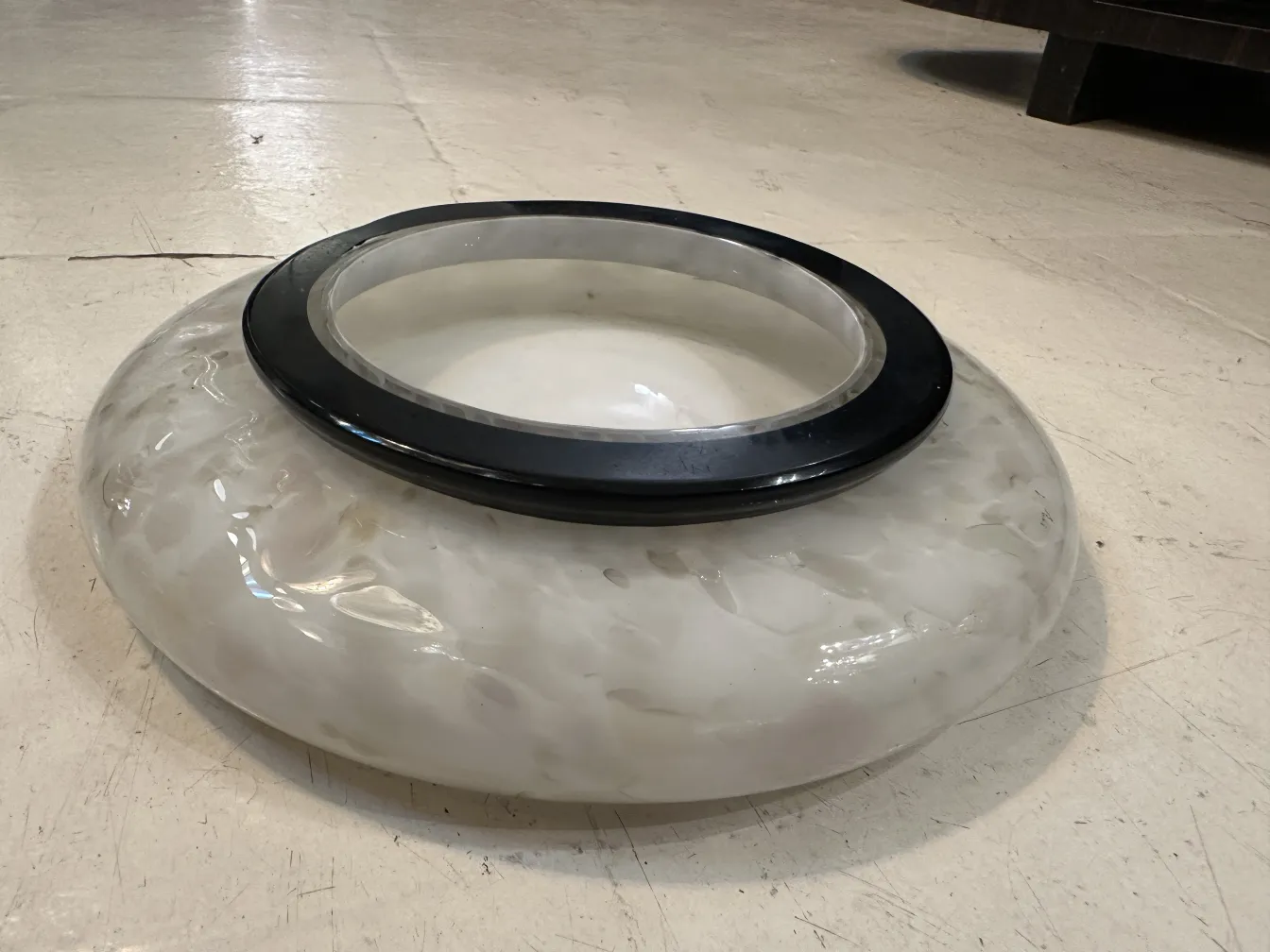 murano vase with black rim and wavy design