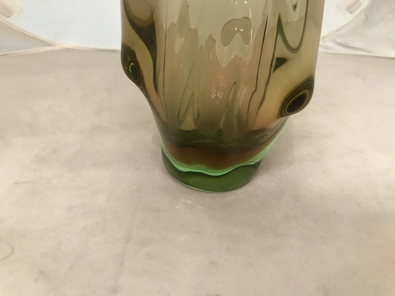 antique murano vase with an elegant colorful design, set against a neutral background