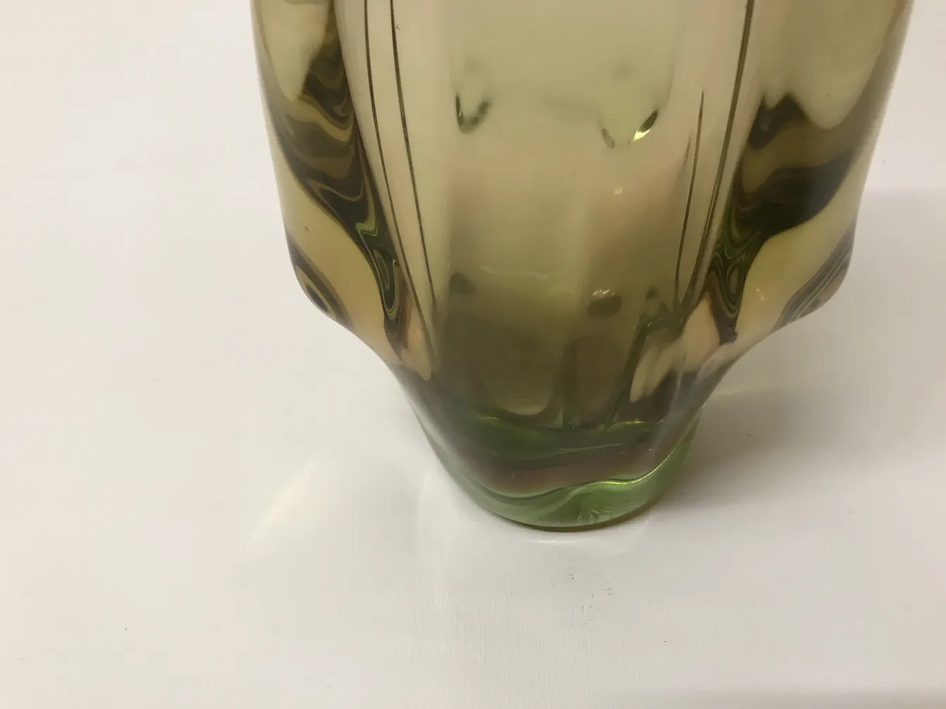 Antique Murano vase elegantly shaped in green and gold tones, perfect for decoration.