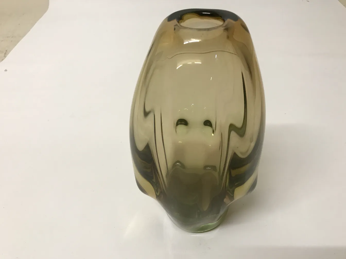 antique murano vase in golden tones, rounded shape