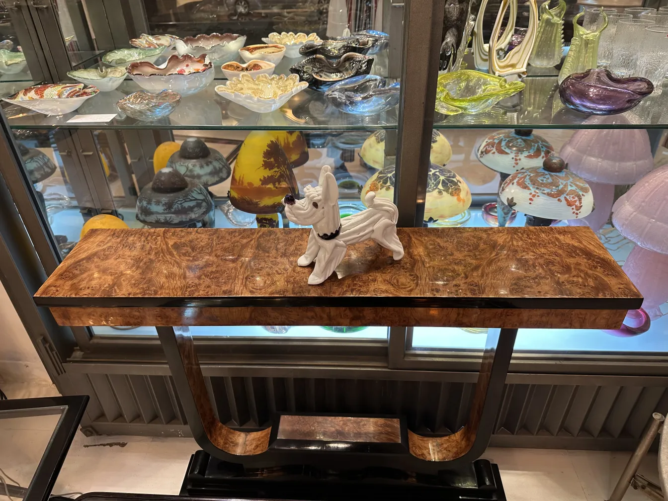 ancient murano sculpture with vibrant colors on table