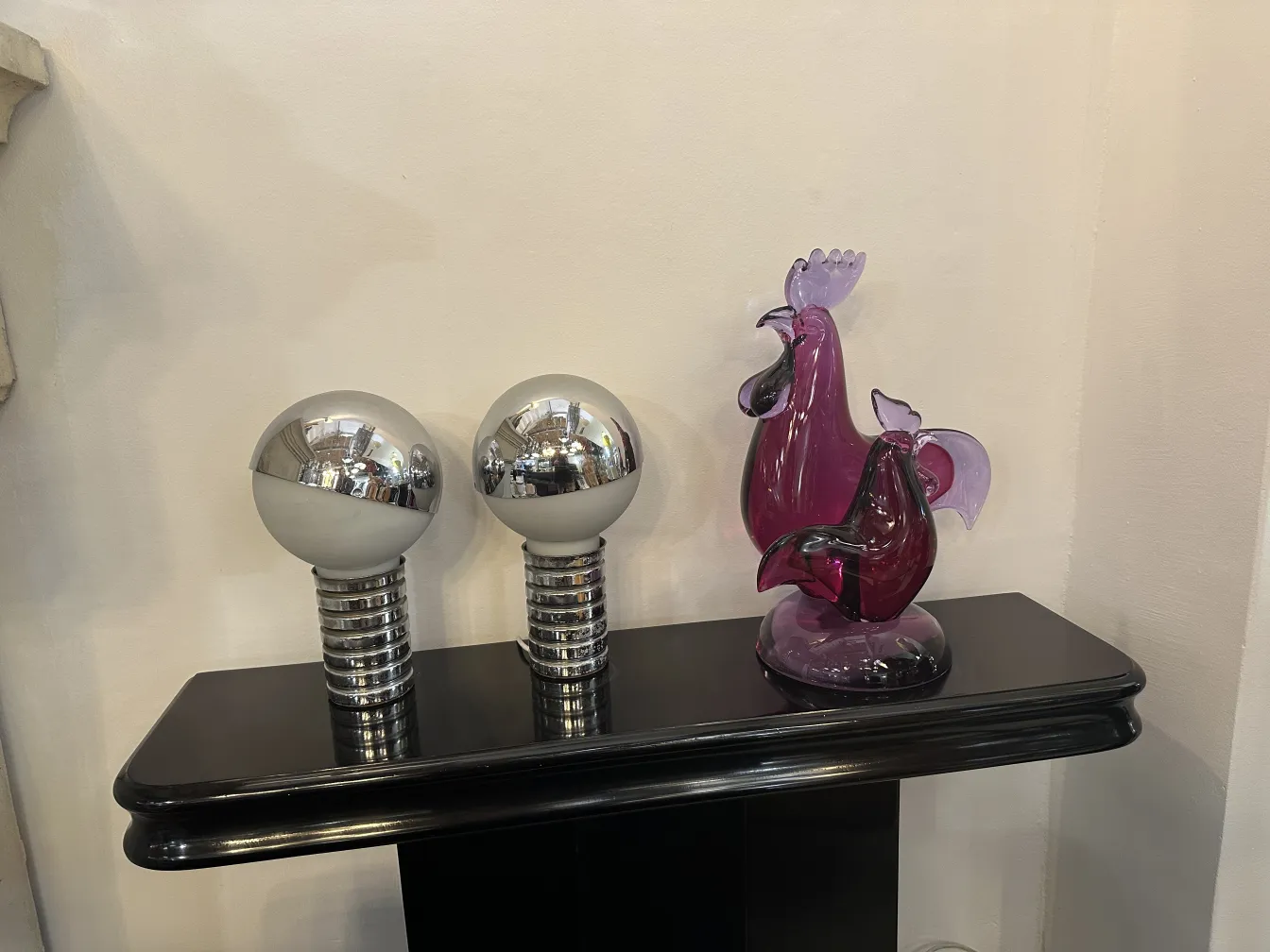 murano sculpture with vibrant colors and bird shape, elegant setting