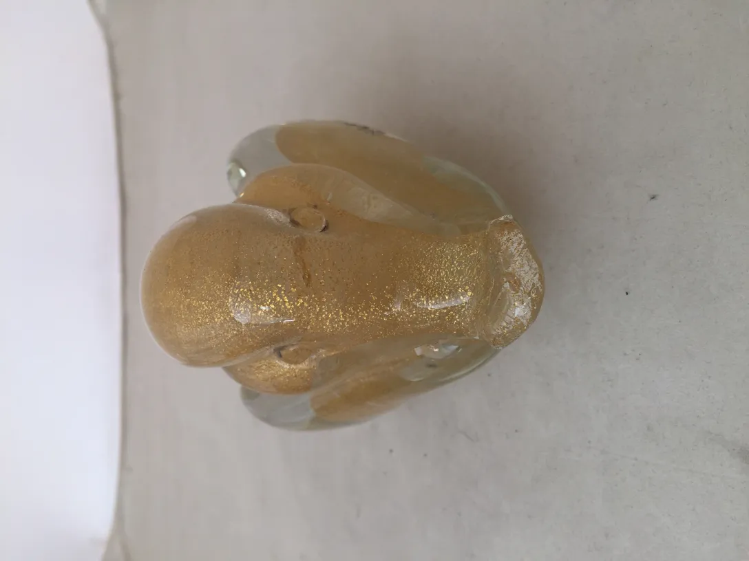 antique murano sculpture of an octopus with golden details