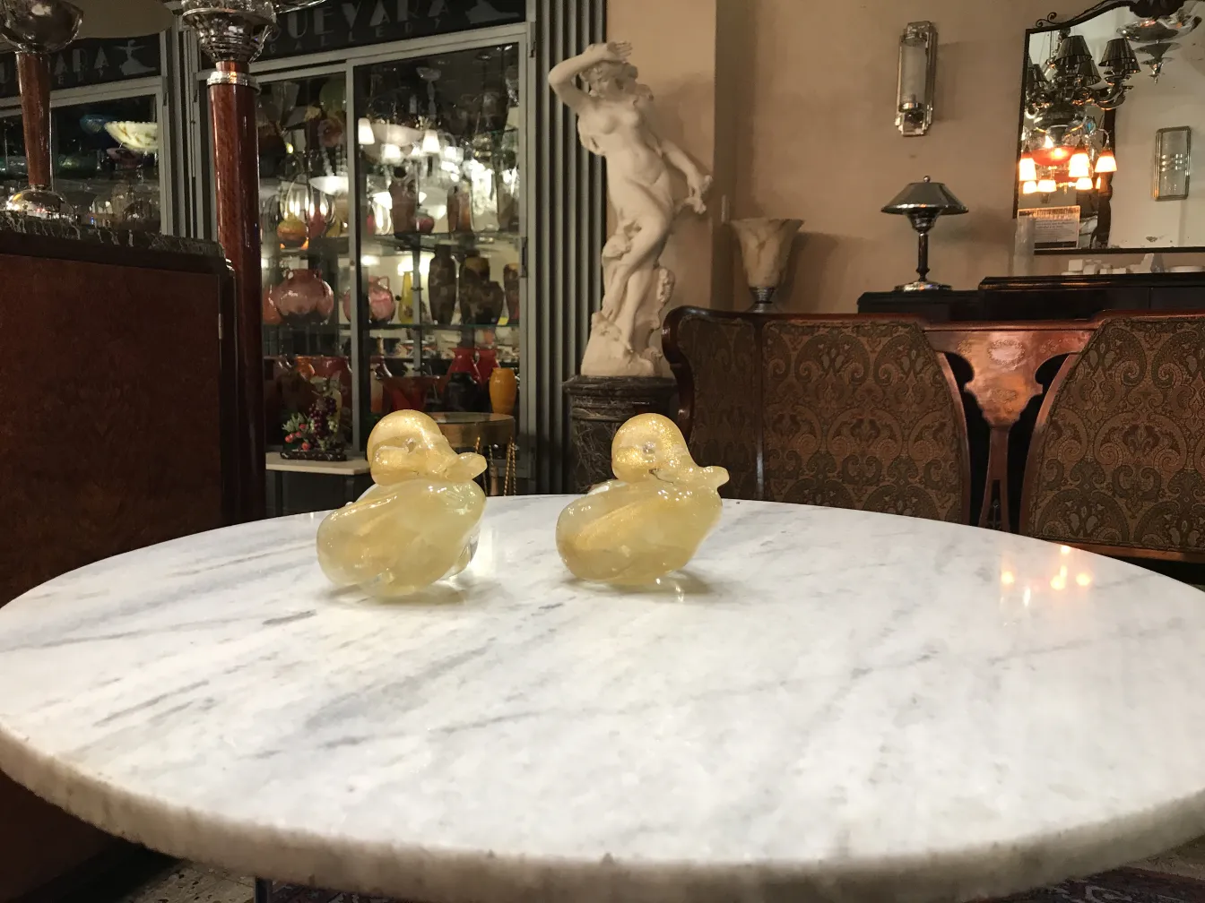 decorative duck sculpture in an antique setting