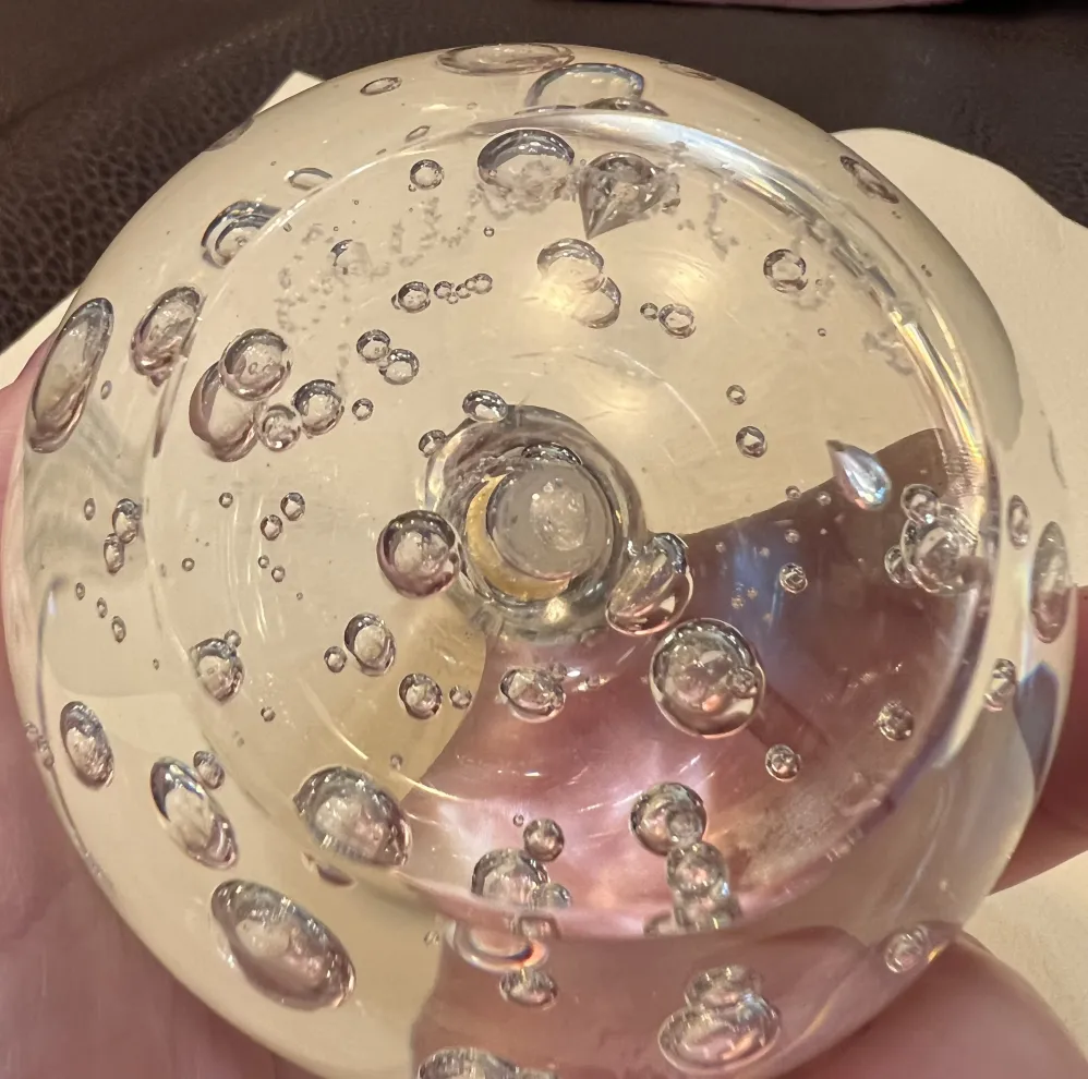 Top view of an antique murano sculpture with bubbles inside