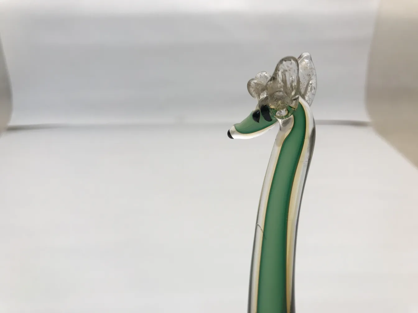 Antique Murano sculpture shaped like an animal, green color.