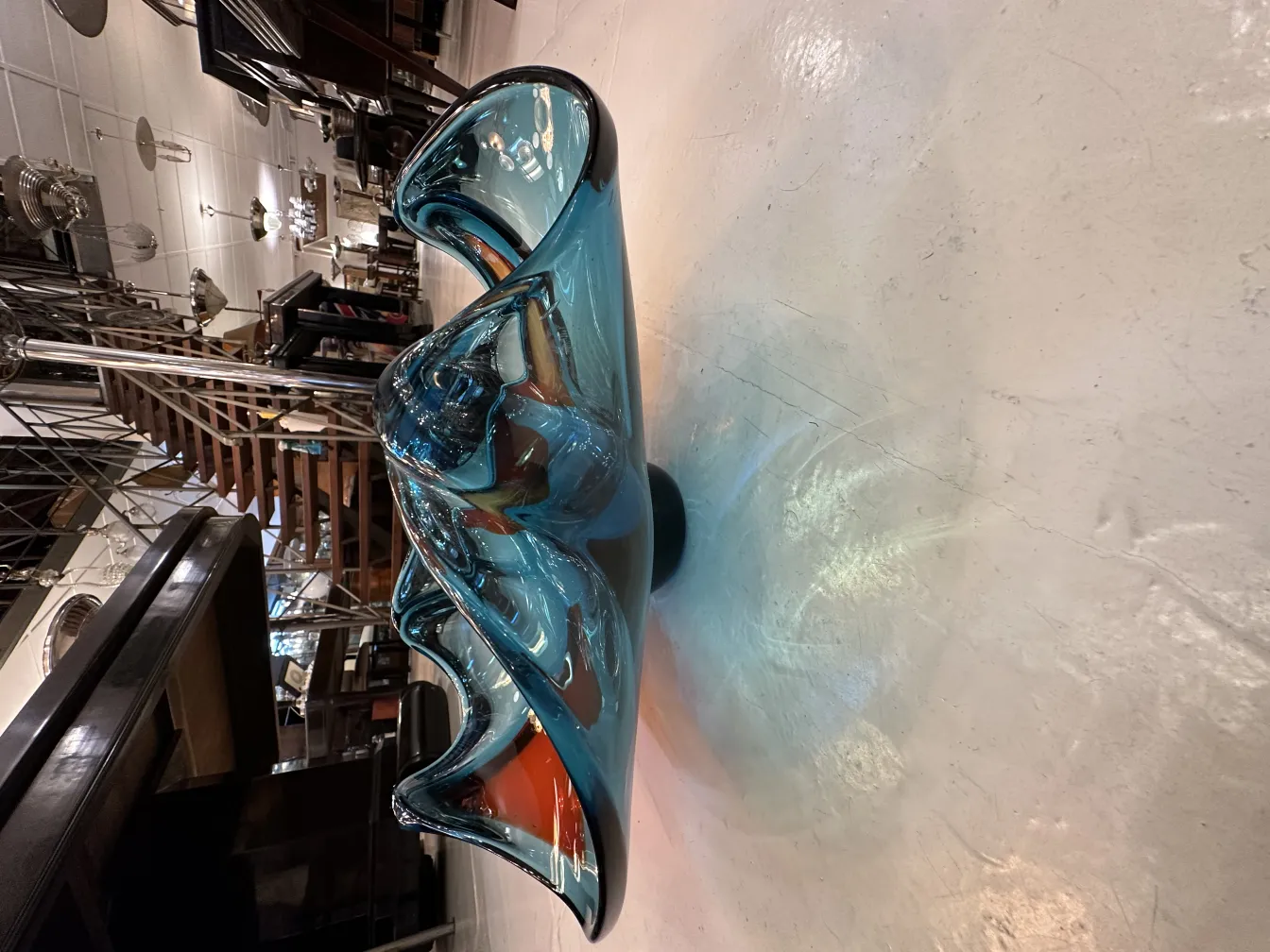 beautiful murano glass with flowing shapes and vibrant colors, antique setting