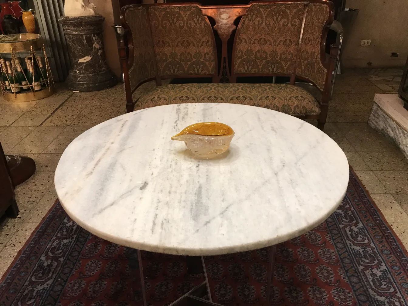 Antique Murano glass with decorative shape and golden color