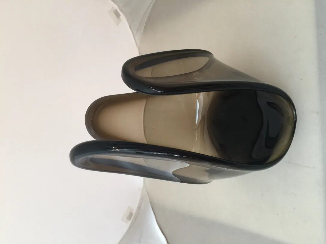 antique murano glass with curved shape and smoky tones