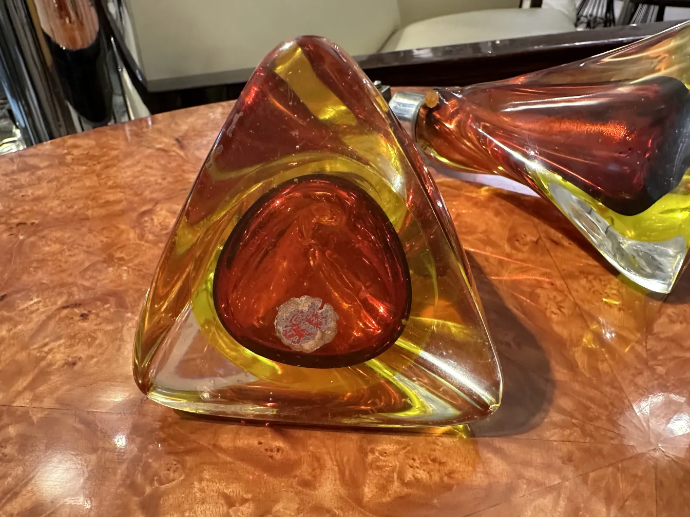 Antique Murano glass triangle with vibrant colors.