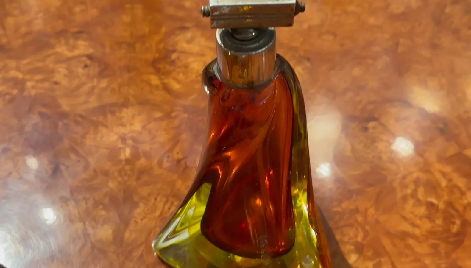 old murano glass bottle with warm colors