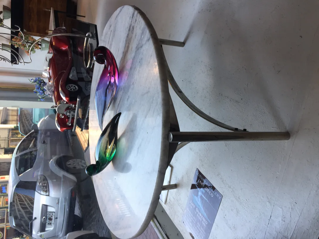 Decorative Murano glass sculpture on a white table